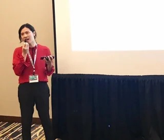 a woman giving a lecture