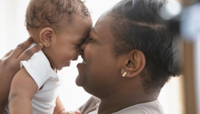 person holding child